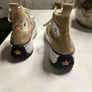 Like new khaki converse run star hike. Paid $150. They have a few tiny scuffs.